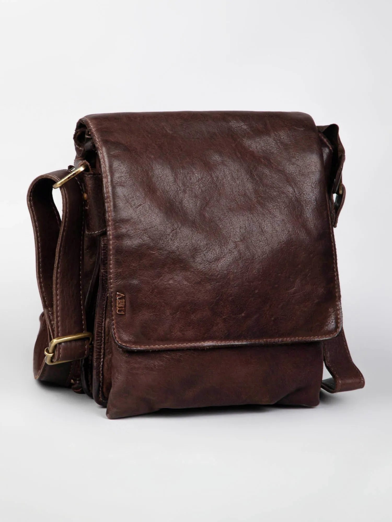 Henry: Brown Flap Bag Cross Body In Veg Tan Leather